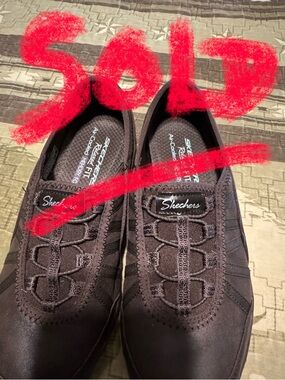 Skechers Women's Slip-On Shoe in Navy and Tan - 2 pair for one price.